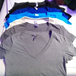 Women's V-neck tees. Size medium.